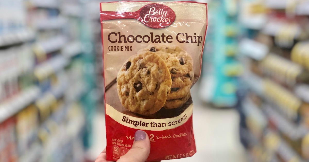 hand holding chocolate chip cookie betty crocker mix