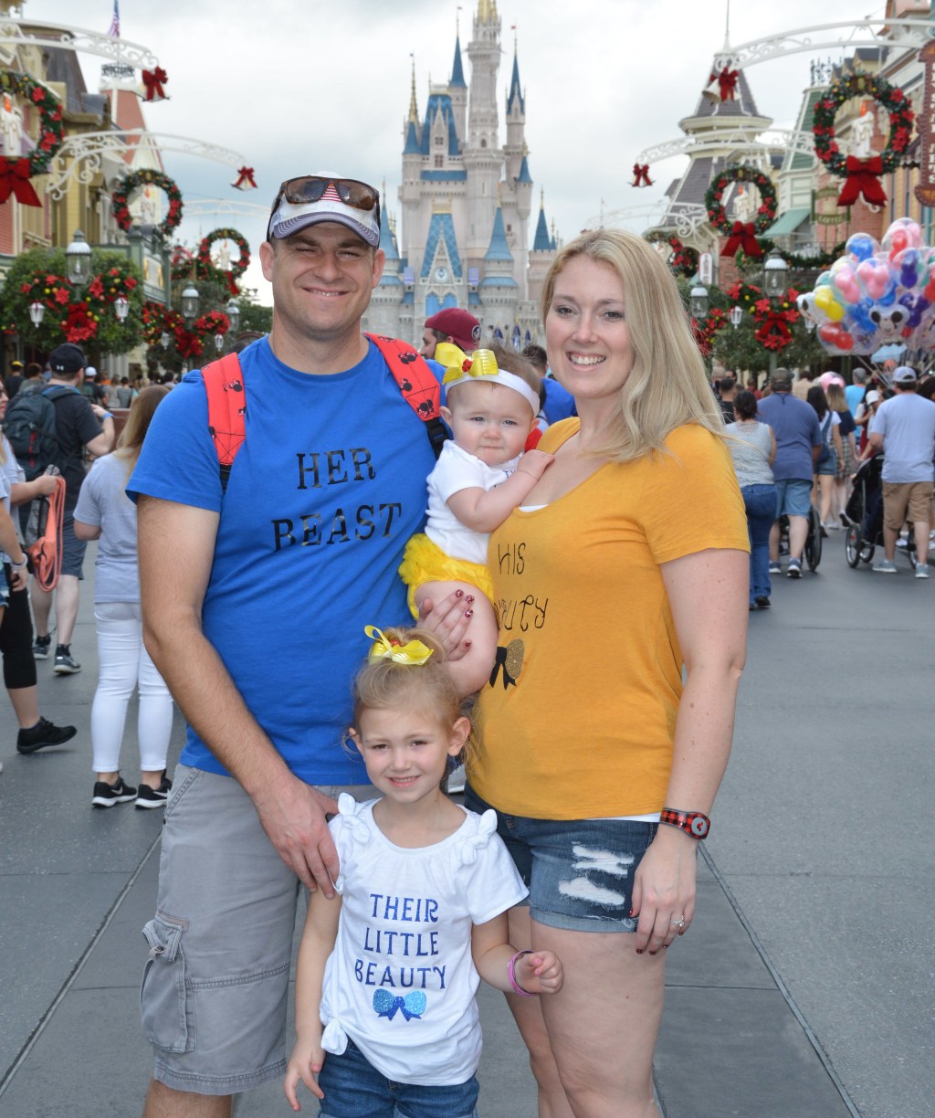 happy friday – cindy and family wearing DIY Disney shirts at Disney World