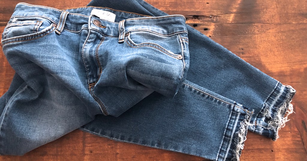 released hem denim diy — original jeans at the end of tutorial