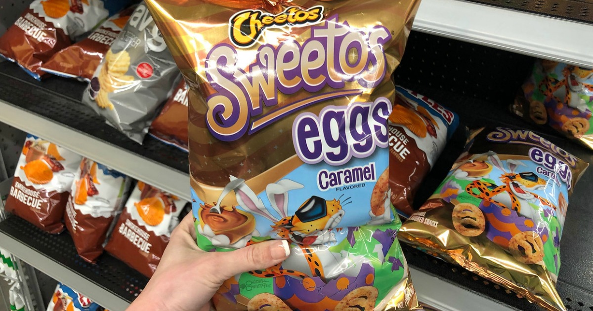 cheetos sweetos eggs in womans hands 