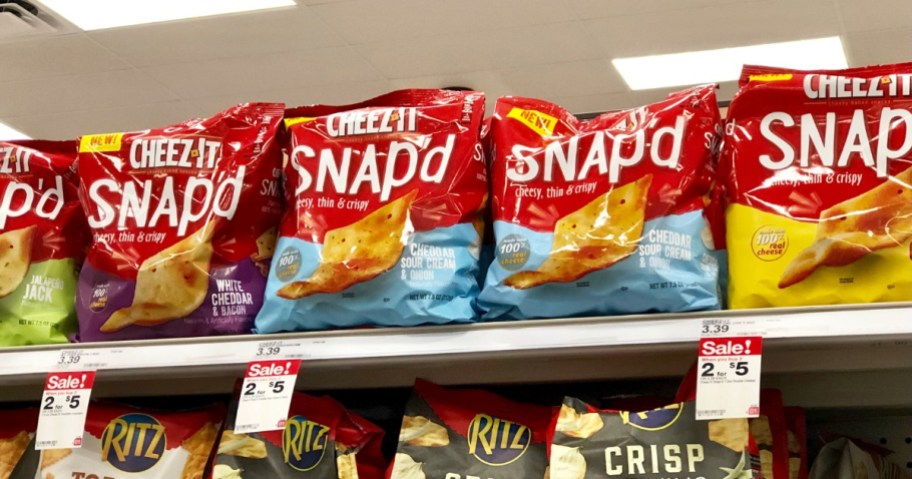two bags of cheez it snap'd sitting on shelf