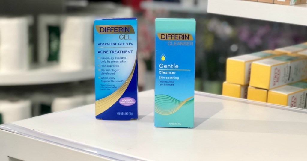 two blue boxes with acne medicine 
