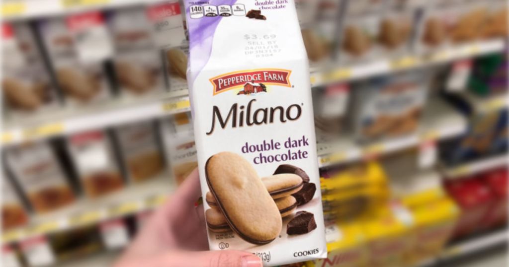 hand holding up bag of milano cookies