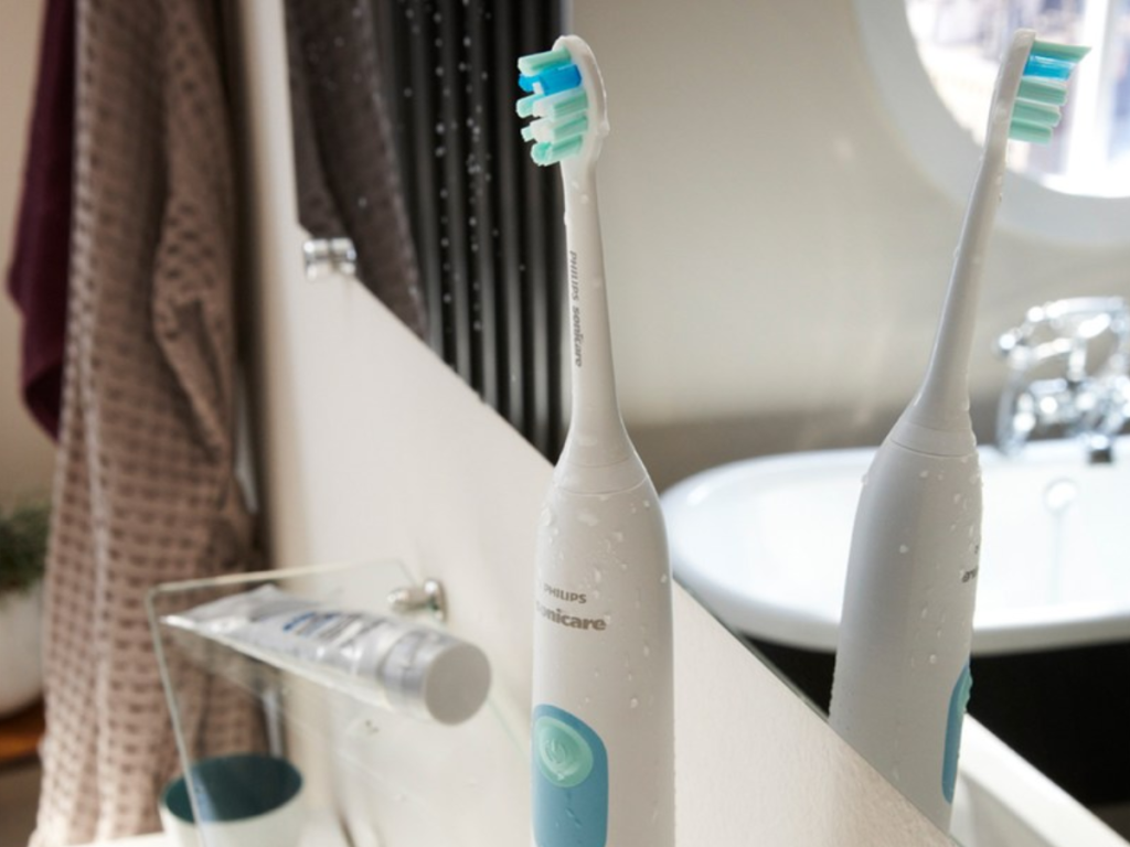 Philips Sonicare Series 2 Plaque Control Rechargeable Toothbrush on bathroom shelf