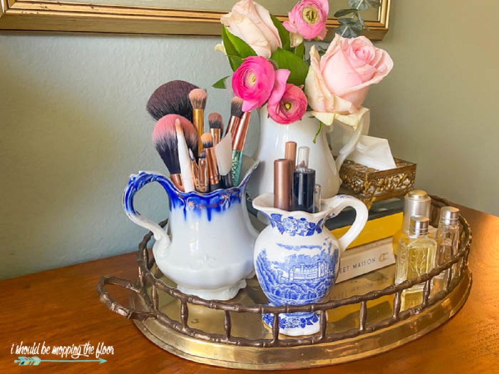 Using a pitcher as a makeup organizer, one of our makeup storge ideas