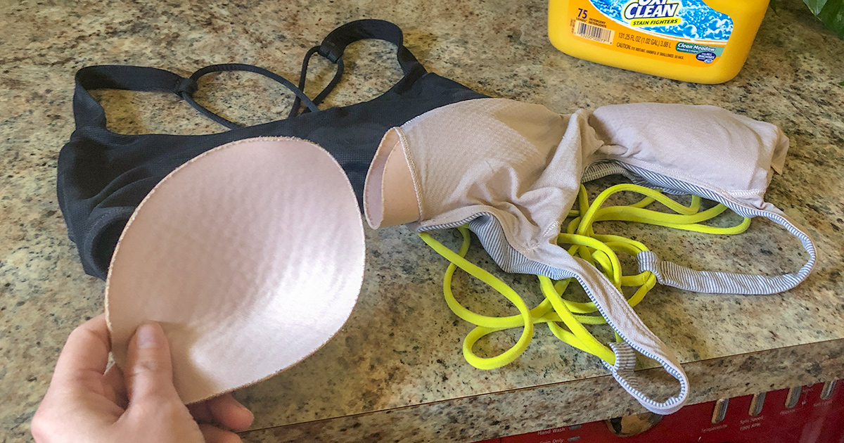sports bras and bra pads on a counter