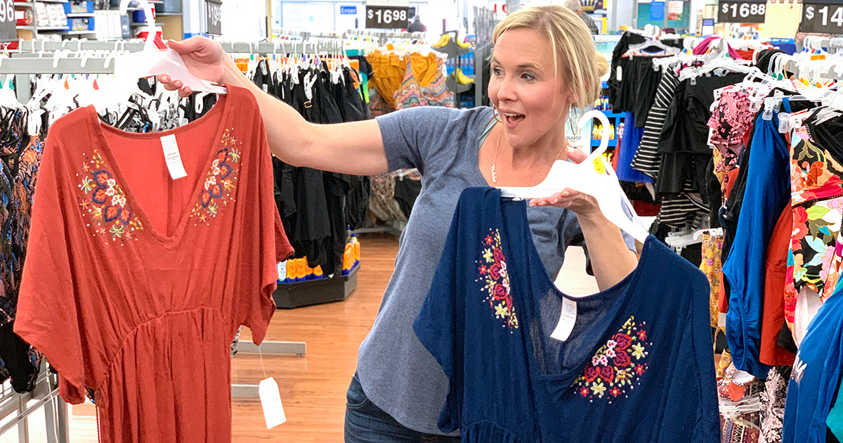walmart wednesday – collin holding up two time and tru cover up dresses