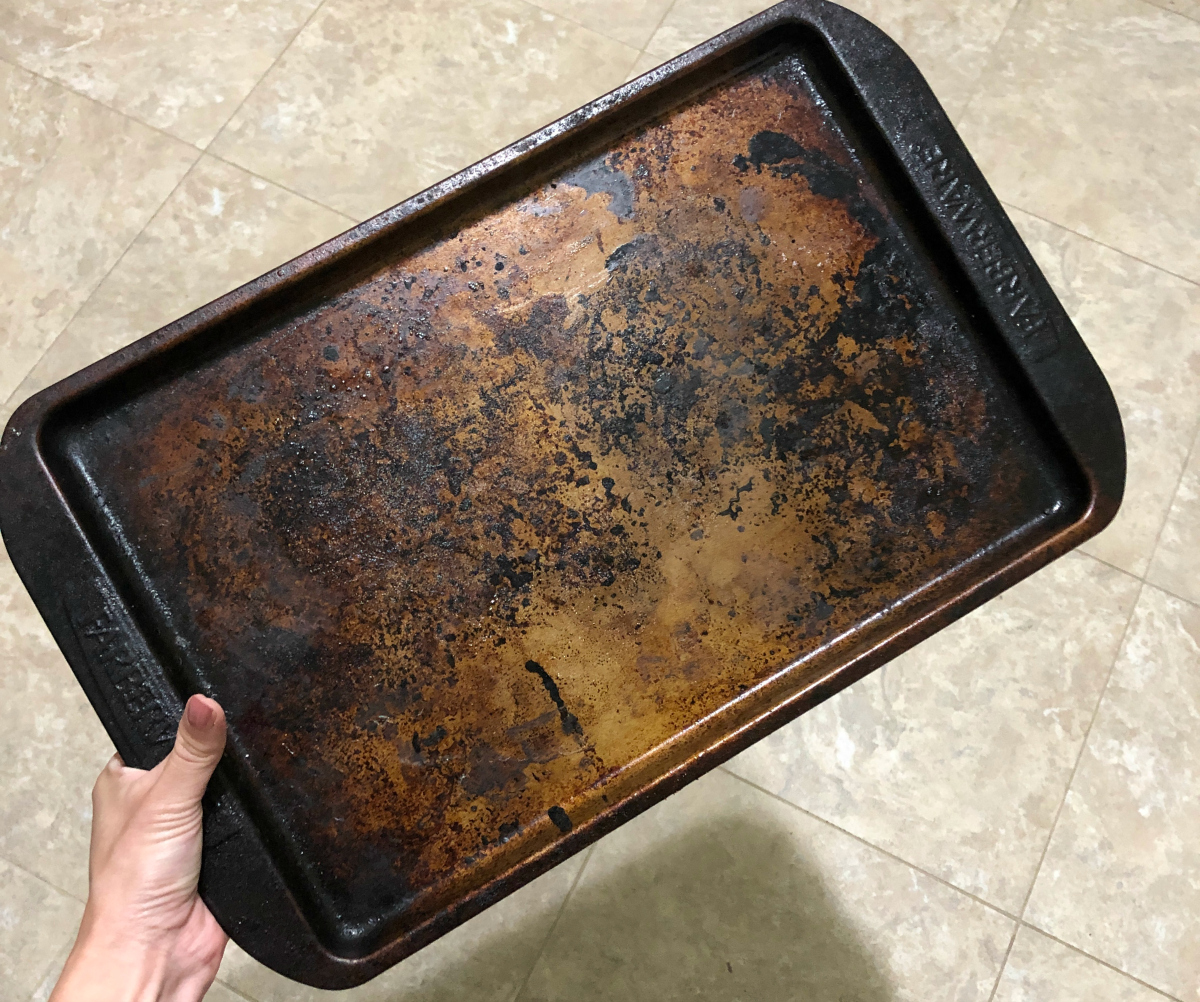 dirty sheet pan with baked on debris