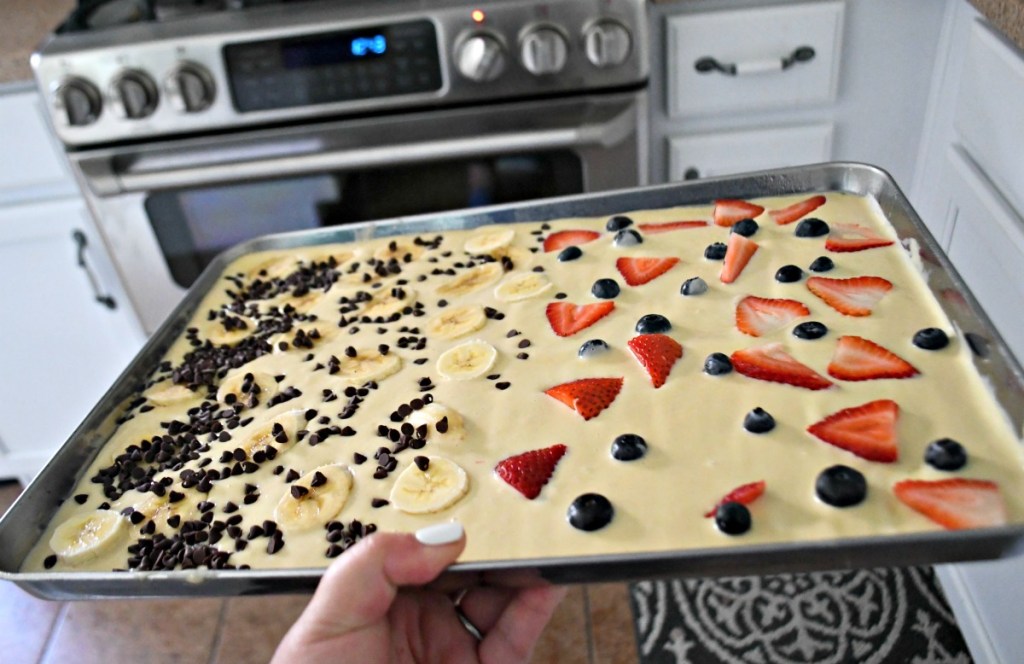 sheet pan pancakes going into the oven 