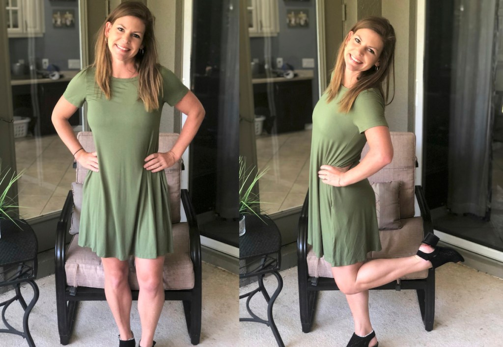 woman wearing green dress standing up with black wedge sandals on feet