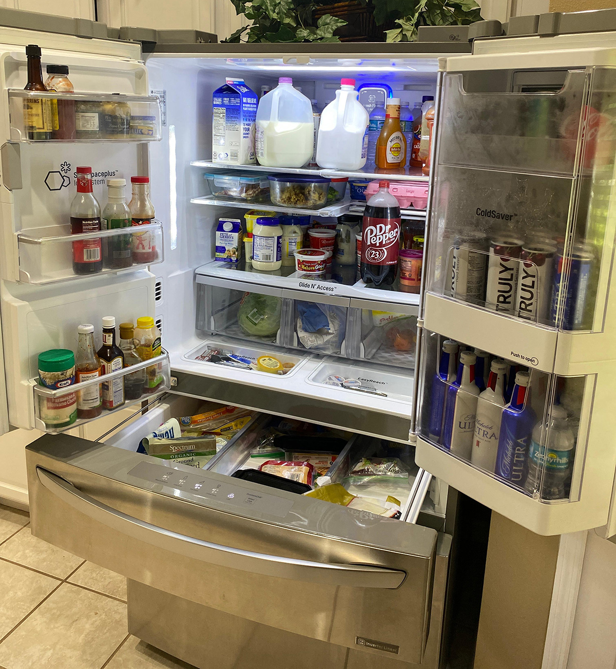 lg refrigerator full with food