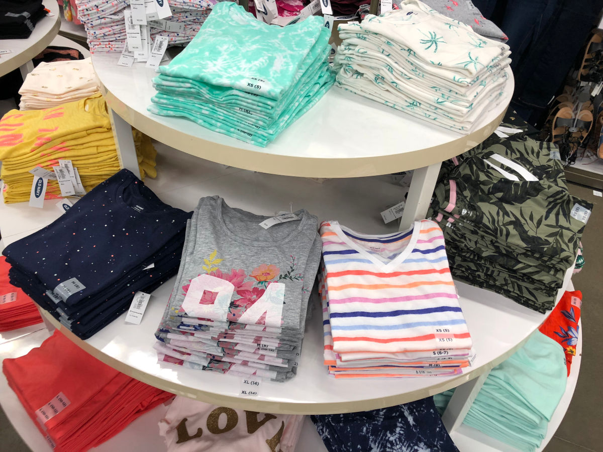 Old Navy girl's tees on table