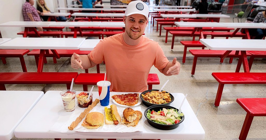 stetson with lots of different costco fast food in front of him on table