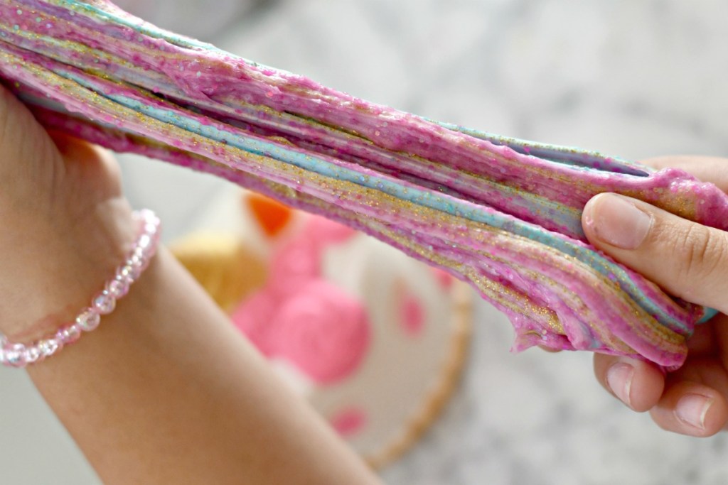 stretched out unicorn striped fluffy slime 