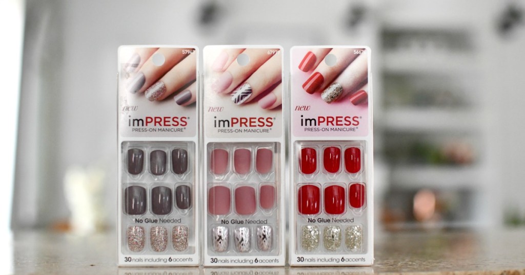 3 packages of Impress Nails