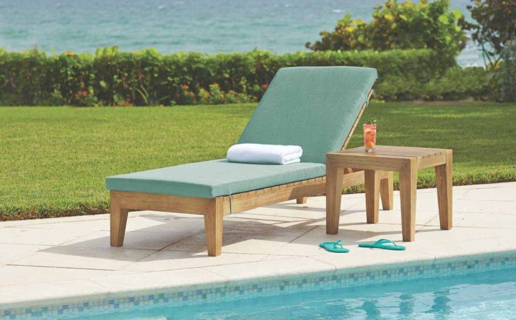 All Weather Patio Chaise with Spa Blue Fabric Cushions by the pool