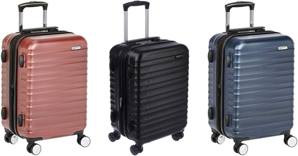 amazonbasics carry on luggage in red, black, and blue