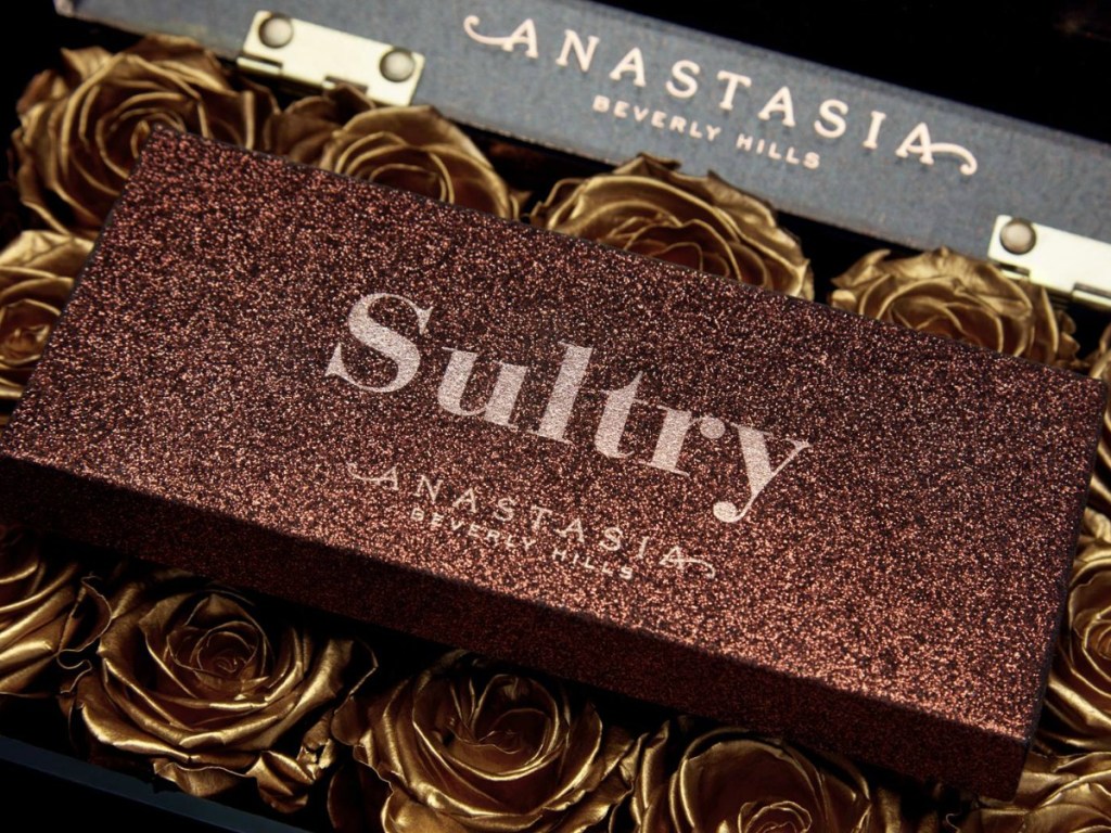 sultry eye shadow palette displayed on gold rosese
