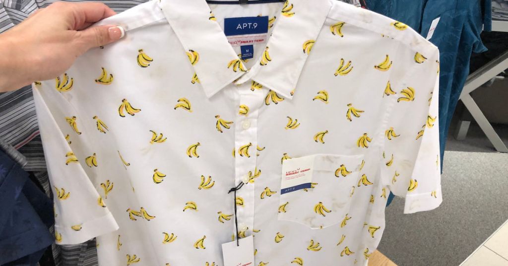 hand holding mens apt 9 button down banana shirt at kohls store