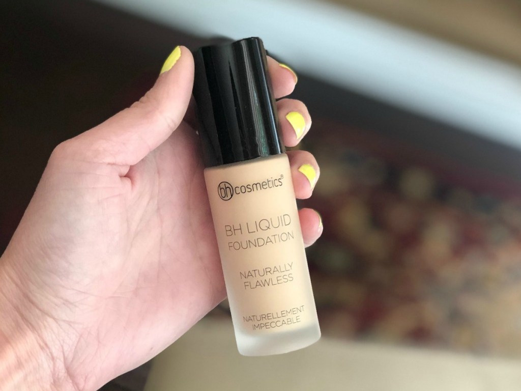 BH Cosmetics foundation held in hand