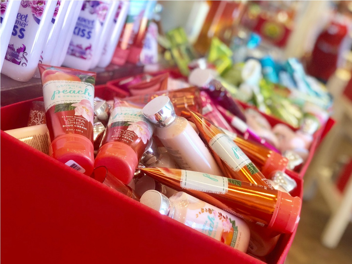 bath body works hand creams and soaps in red bins