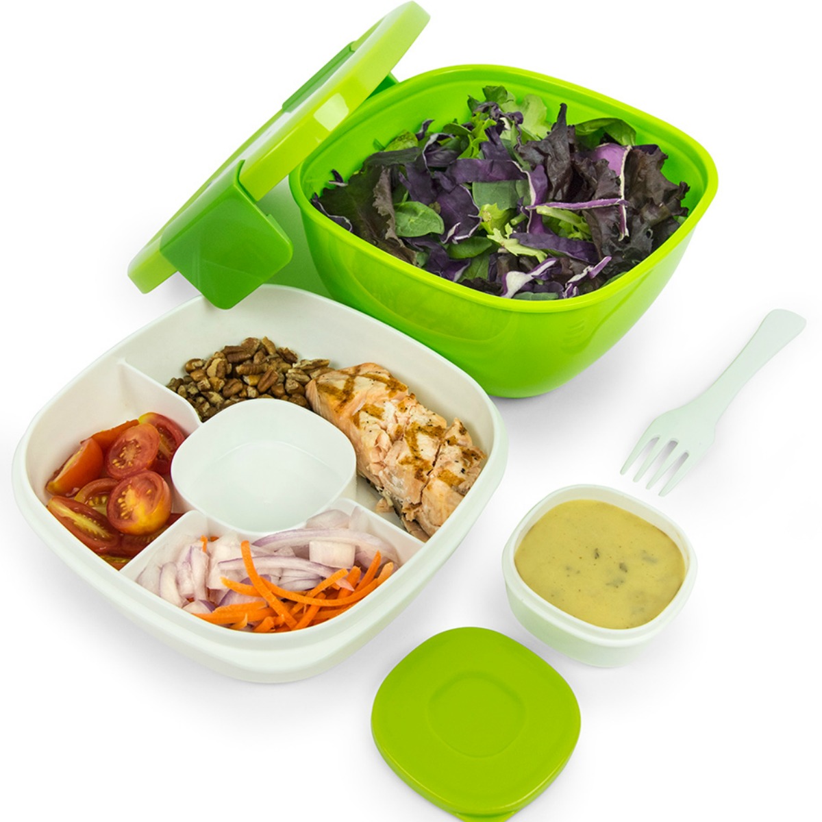 Salad container with mixed greens, fork, and grilled chicken.