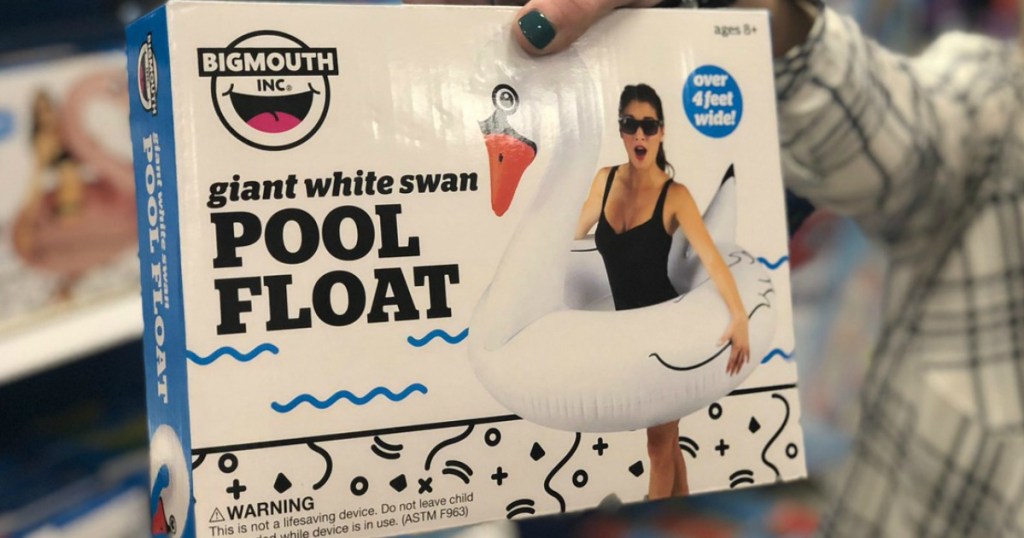 woman holding Big Mouth Inc. Swan Pool Float