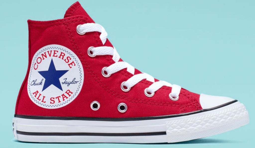 Chuck Taylor All Star Oversized Logo High Top in red with light blue background