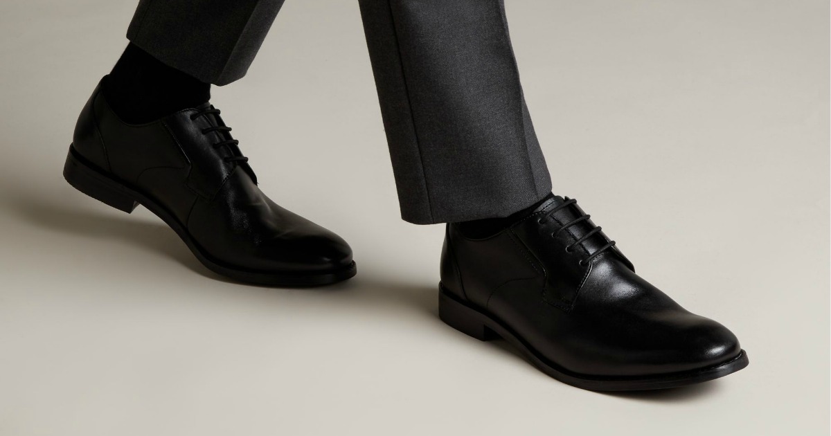 Man walking in a pair of Clarks Edward Plain Black Dress shoes