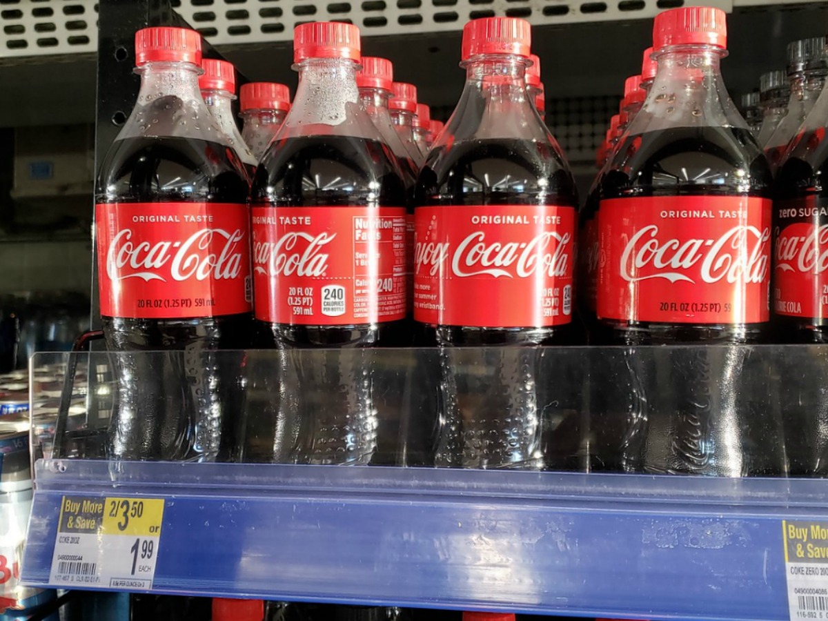 Coca-Cola Bottles on refrigerated cooler shelf