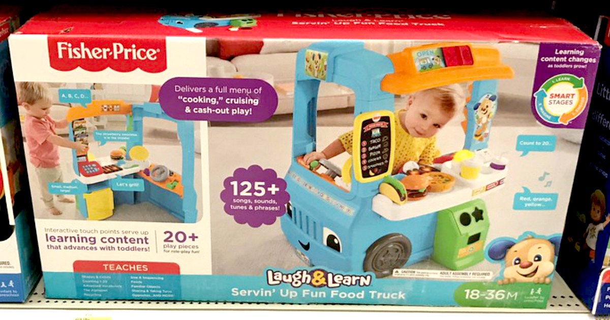 Fisher-Price Laugh and Learn Servin' Up Fun Food Truck in the box sitting on a shelf
