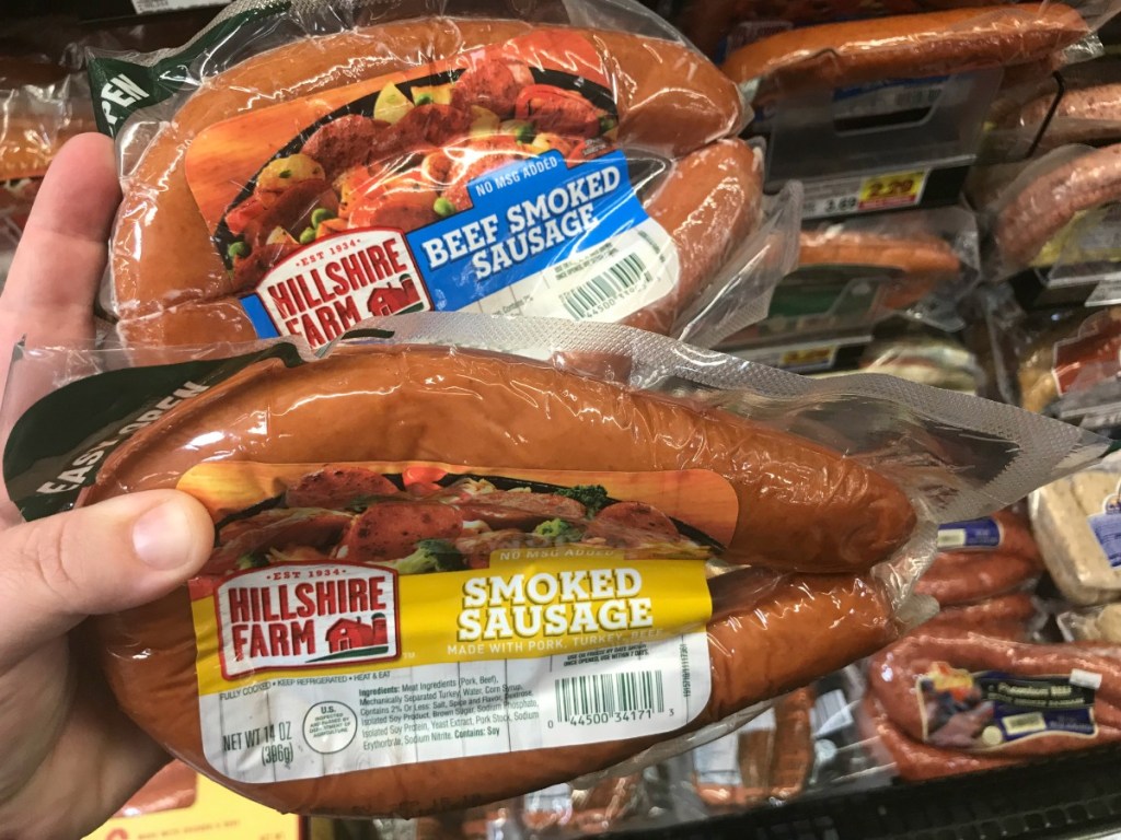 Hillshire farm roped sausage packs held in hand