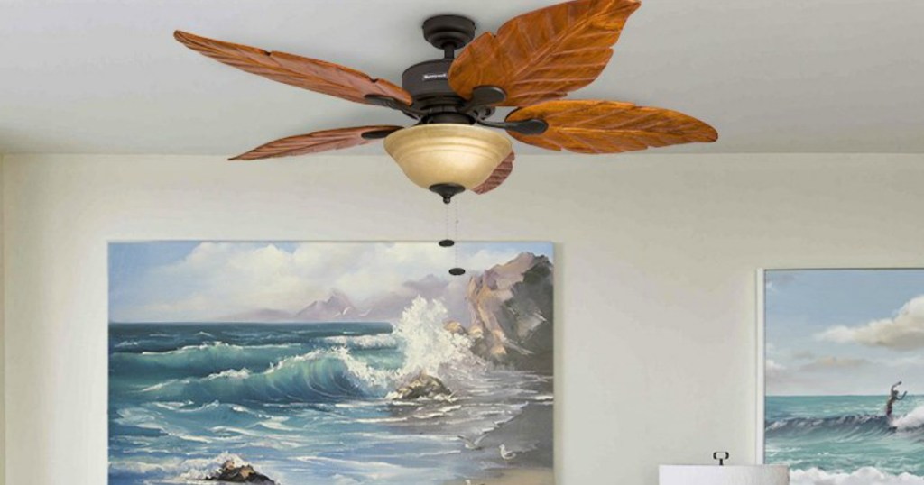 leaf fan with light fixture on ceiling