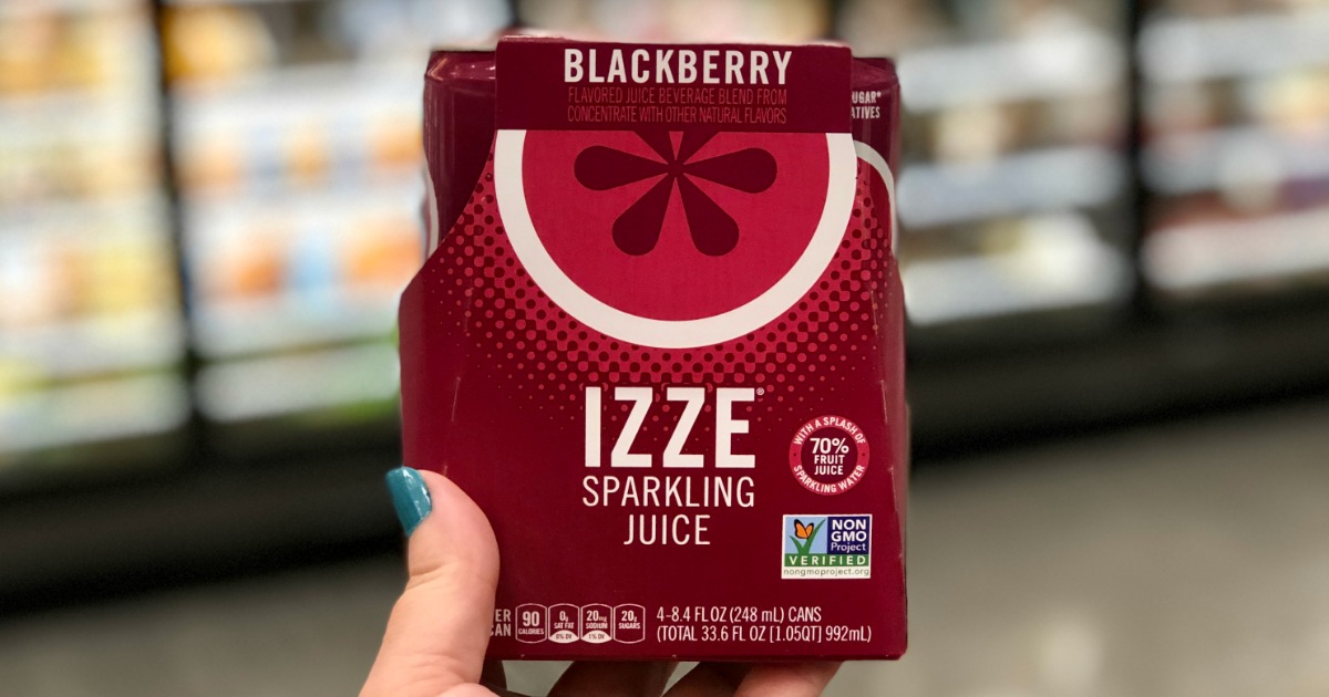 woman holding IZZE blackberry sparkling juice