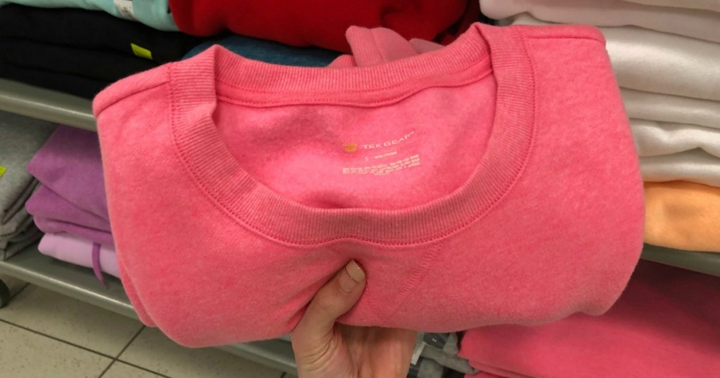 pink sweatshirt in the store in-hand