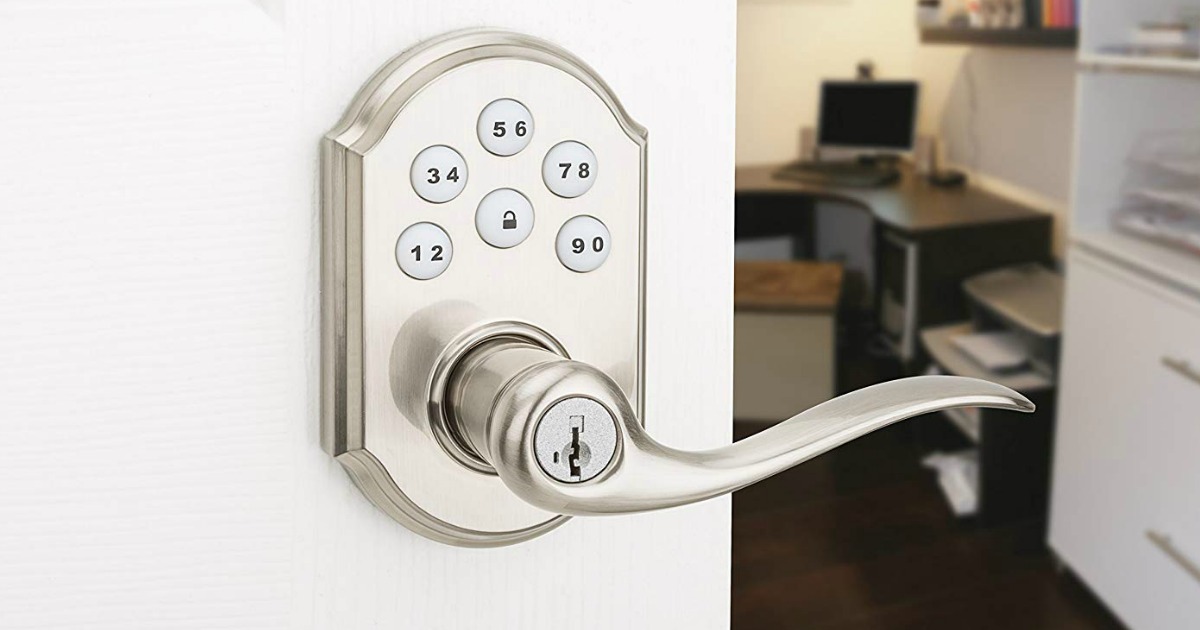 closeup of an electronic keypad lock with handle on a door leading into an office