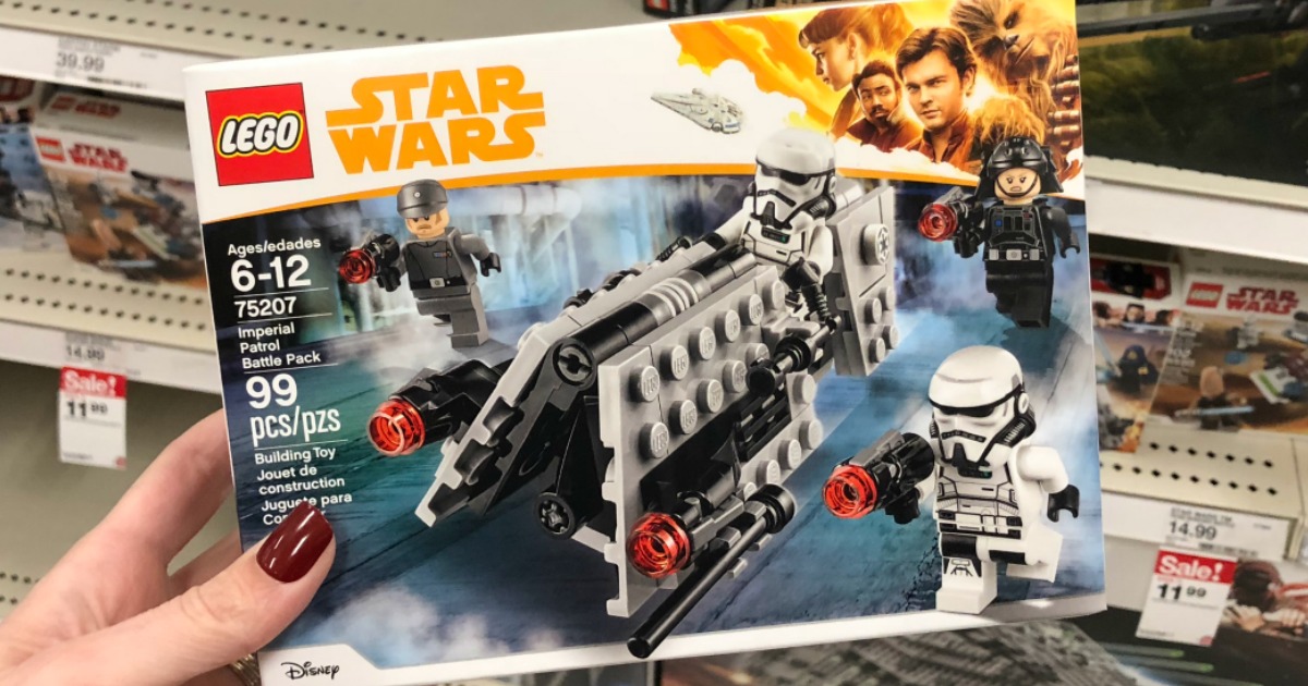 hand holding LEGO Star Wars building set