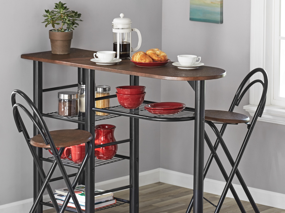 brown, black, and marble Mainstays 3-Piece Brooklyn Counter Height Dining Set with coffee press, croissant, and red dining ware set