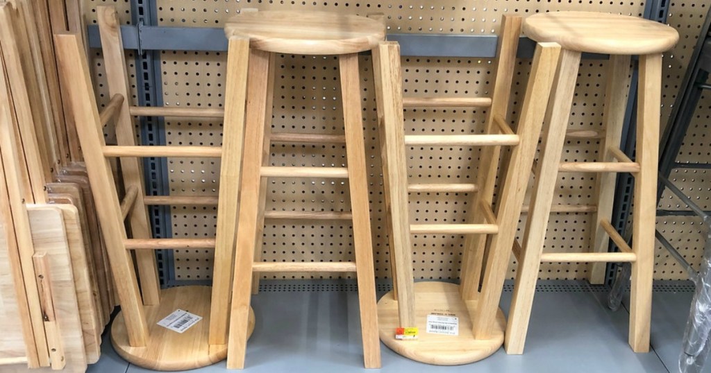 four stools sitting in a store display at Walmart