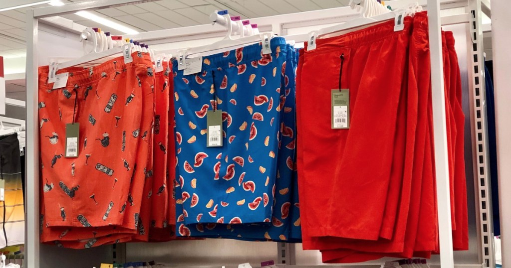 Men's Swimwear hanging on a Target rack