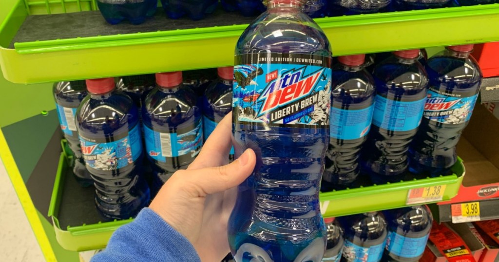 hand holding Mountain Dew Liberty Dew filled with blue fluids