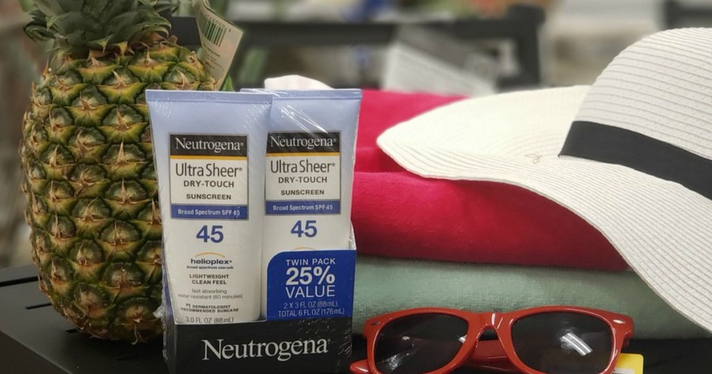 Neutrogena Ultra-Sheer Suncreen 2 pack with pineapple, sunglasses, hat and towels