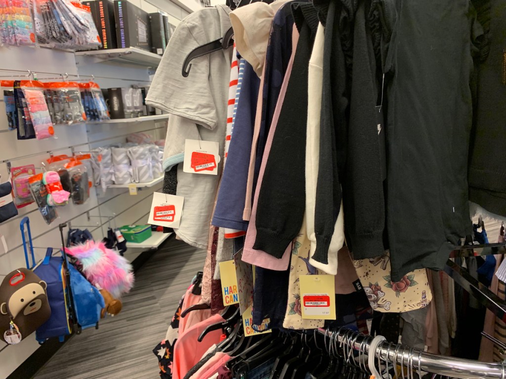 kids clothing hanging up on rack