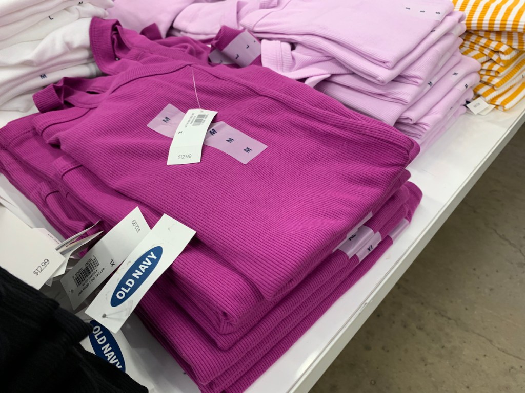 Old Navy tank tops on a table