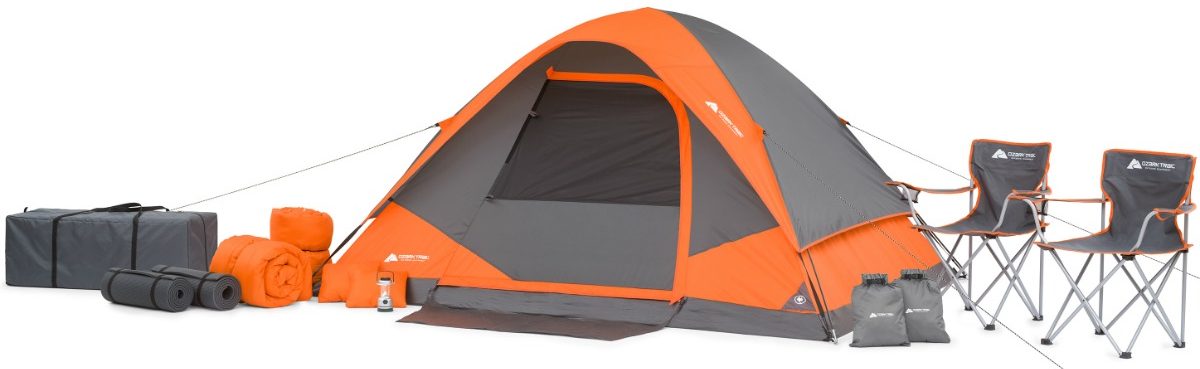 orange tent, camping chairs, sleeping bags and bags