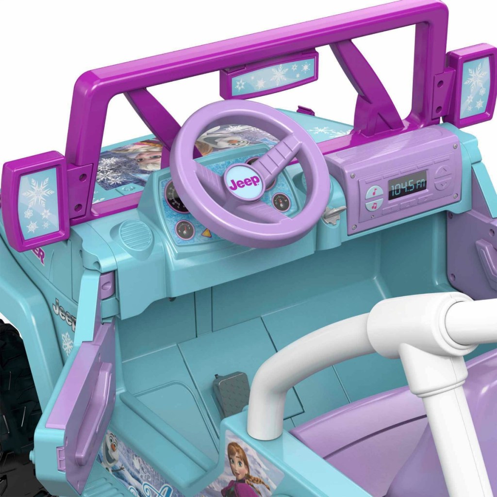 pink and purple interior of Disney Frozen Power Wheels ride-on toy
