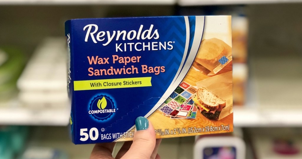hand holding reynolds wax paper sandwich bags box