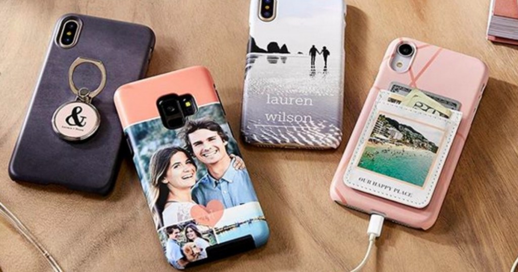 Shutterfly phone cases and holder on table