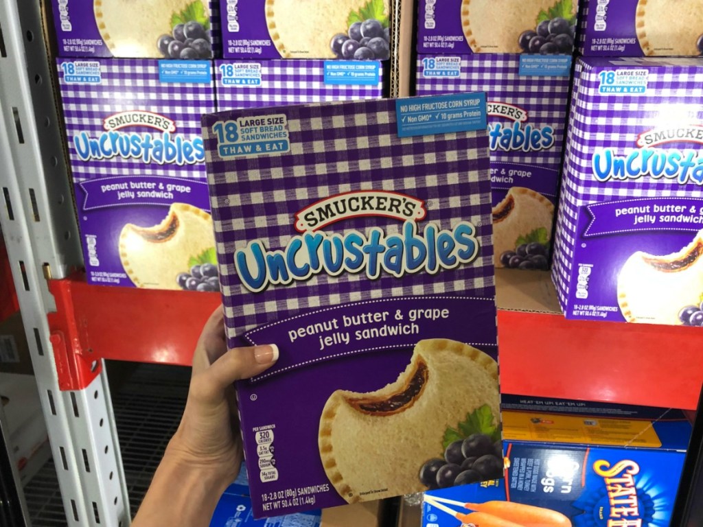 lady holding Smucker's Uncrustables at Sam's 