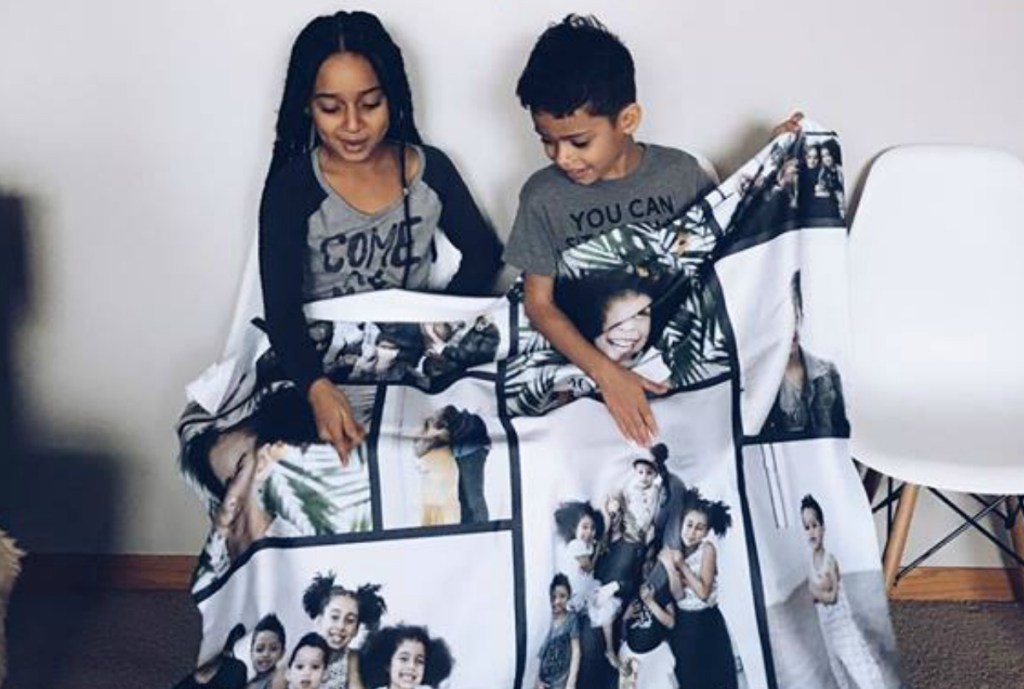 boy and girl sharing personalized photo blanket